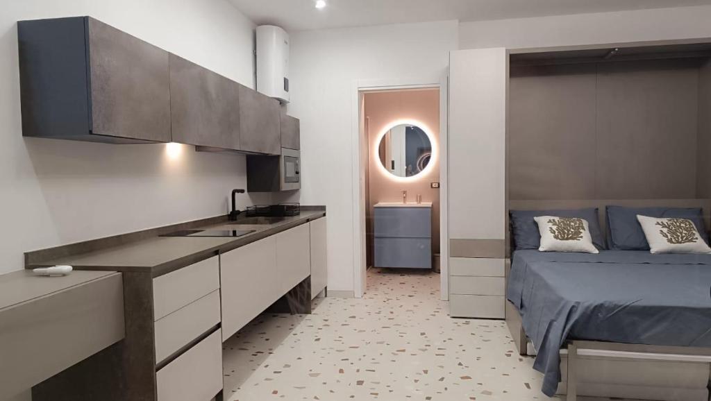 Cucina con zona notte e bagno